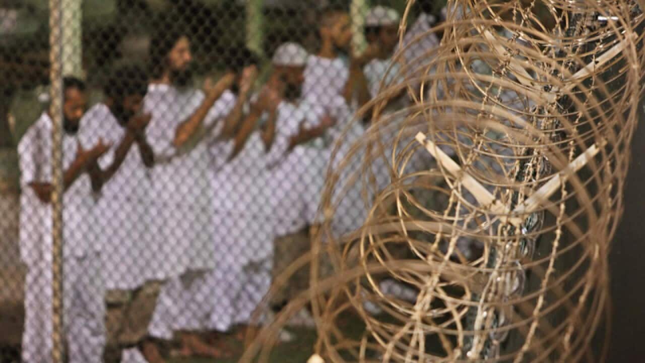 Guantanamo detainees pray before dawn