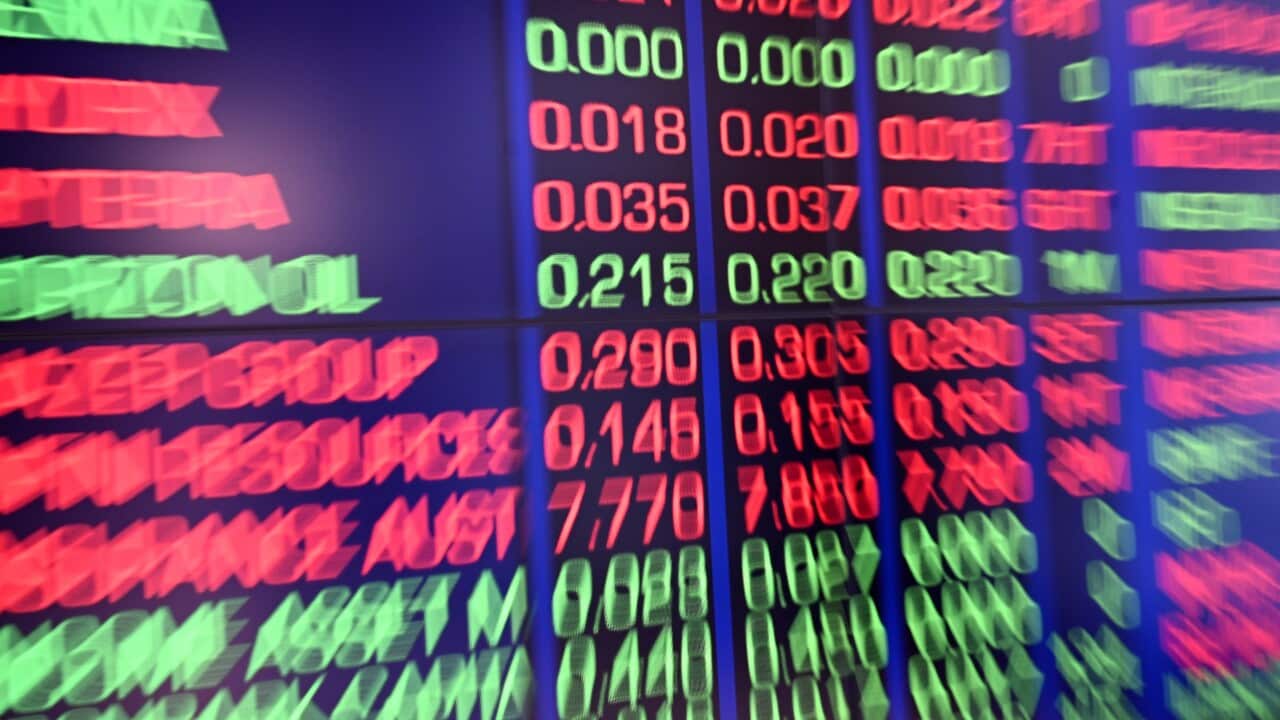 Indicator board showing stock prices at a stock exchange.