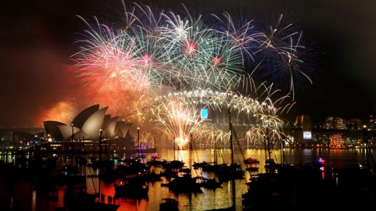 Midnight New Year's Eve Fireworks on Sydney Harbour at Mrs Macquarie's Point in Sydney, Thursday, Jan. 1, 2015. (AAP Image/Nikki Short) NO ARCHIVING