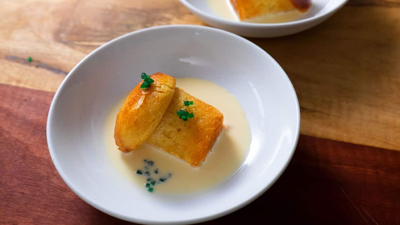 Rum baba with vanilla custard SBS Food