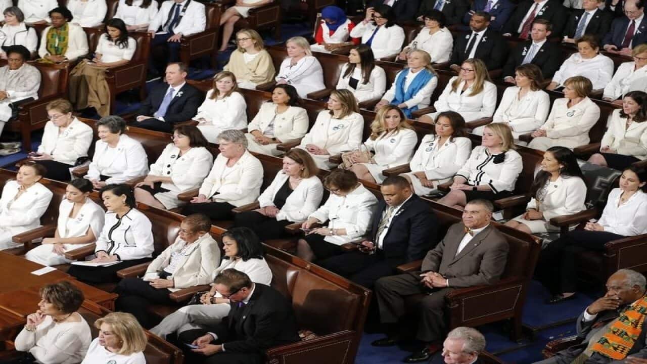 Democrin white during US President Donald Trump's speech.
