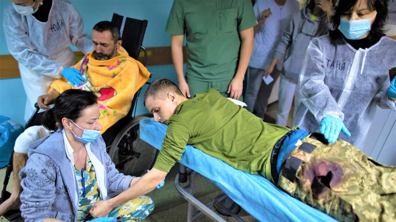 Ukrainian soldier wounded during the Battle of Hostomel, arrives at the emergency area of a public hospital in Kyiv on March 12, 2022. During the Russian Invasion of Ukraine. Photo by Raphael Lafargue/ABACAPRESS.COM.