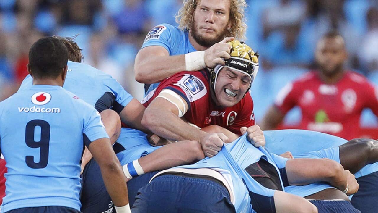 Bulls' RG Snyman (C-L) in action against Reds' Cadeyrn Neville
