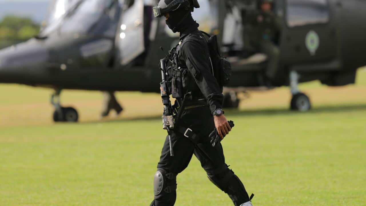 A soldier takes part in an aerial exercise ahead of the Olympics