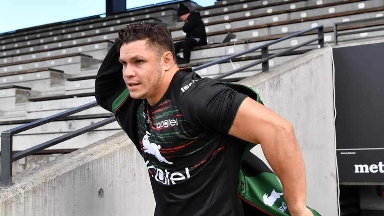 James Roberts pulls on his training jacket.