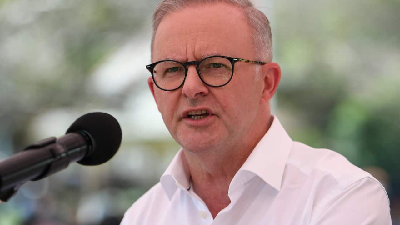 Prime Minister Anthony Albanese gives a speech at the microphone