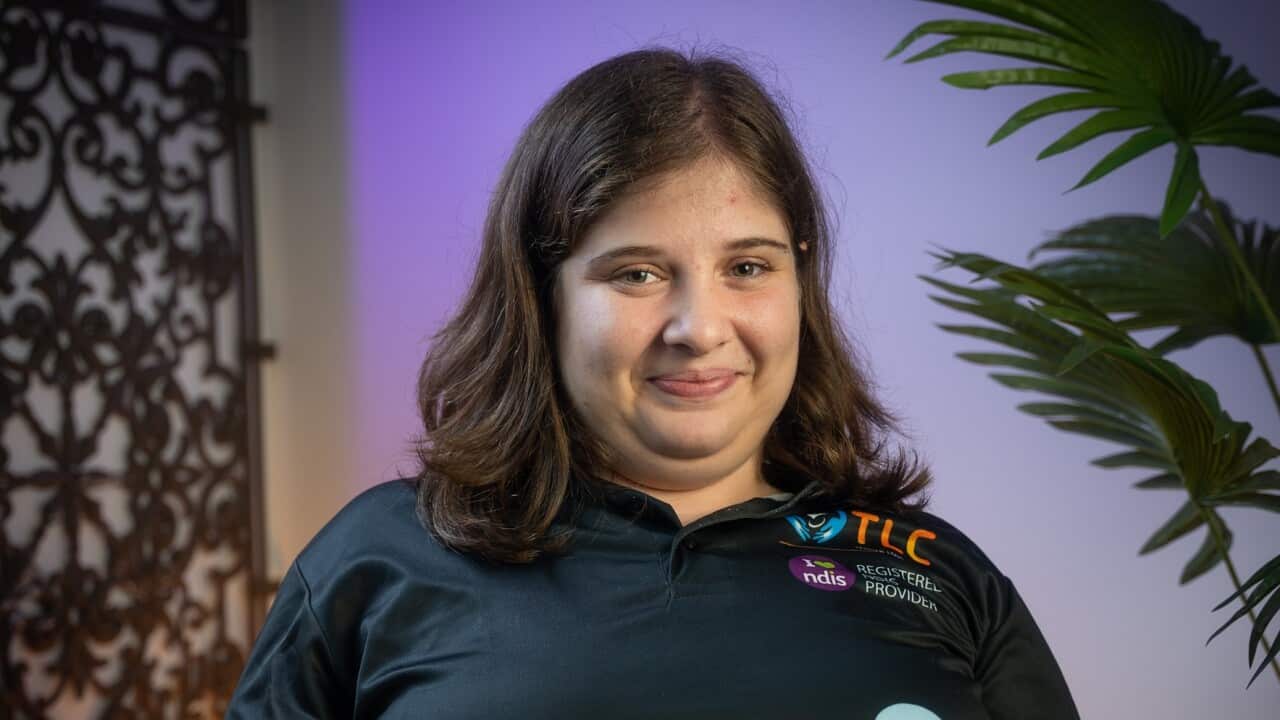 Rita Nichola, 22, at work in Sydney (SBS).jpg