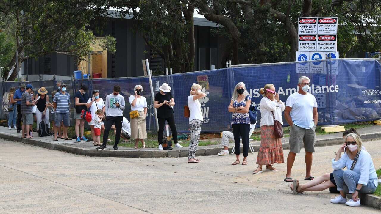 People line up for Covid-19 testing.