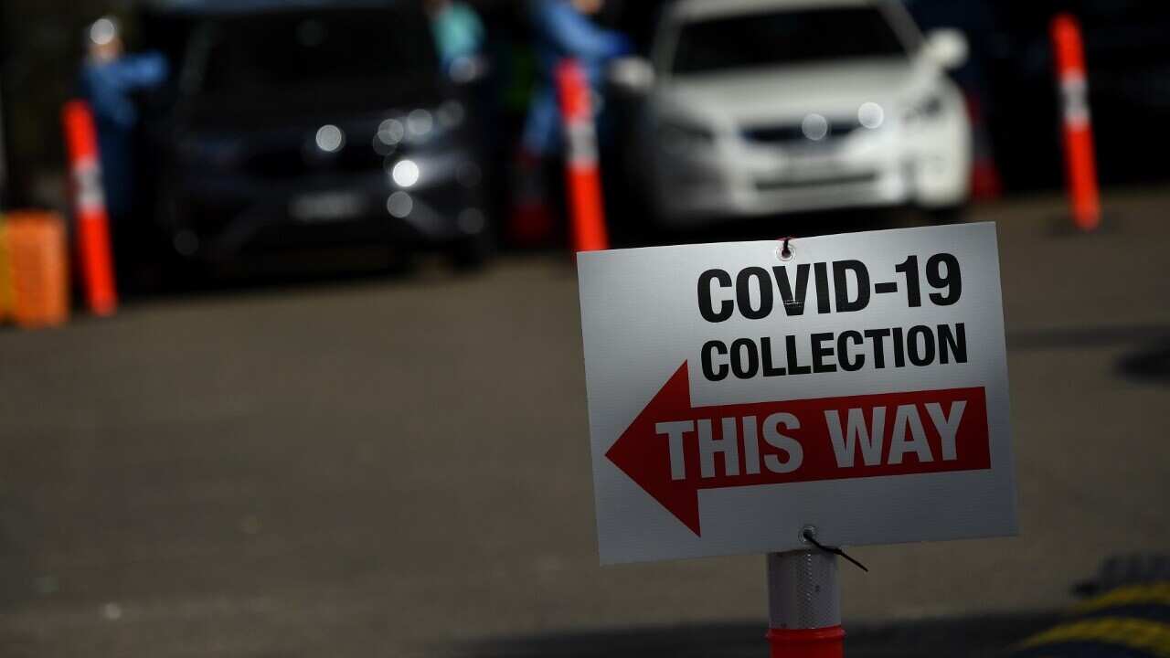 Signage at a pop up COVID clinic at Roselands shopping centre in Sydney (AAP)