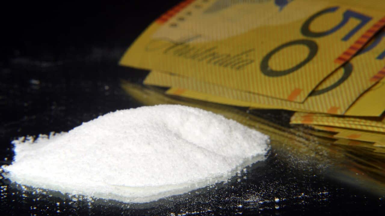 ADDITIONAL RATES MAY APPLY FOR USE OF IMAGE. Melbourne, June 2003. Illegal drugs and a roll of Australian fifty dollar ($50) notes. (AAP Image/David Ewing) NO ARCHIVING