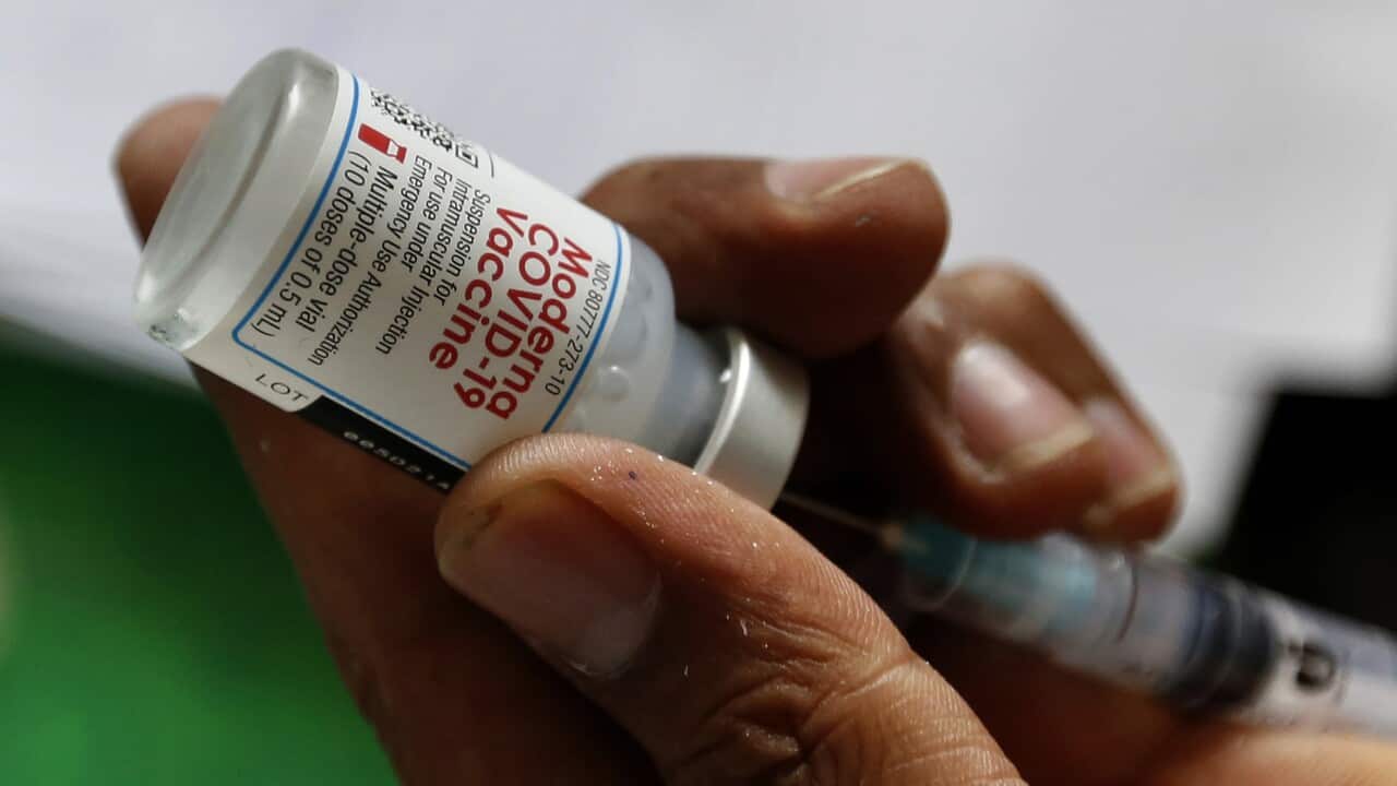Moderna's Covid vaccine being prepared for injection