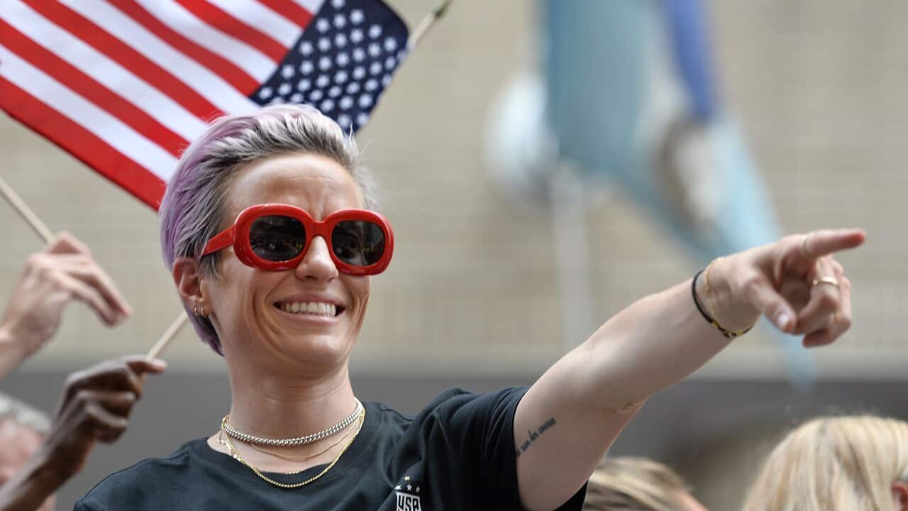 Megan Rapinoe has stolen the show at the parade for the World Cup winning US women's football team.