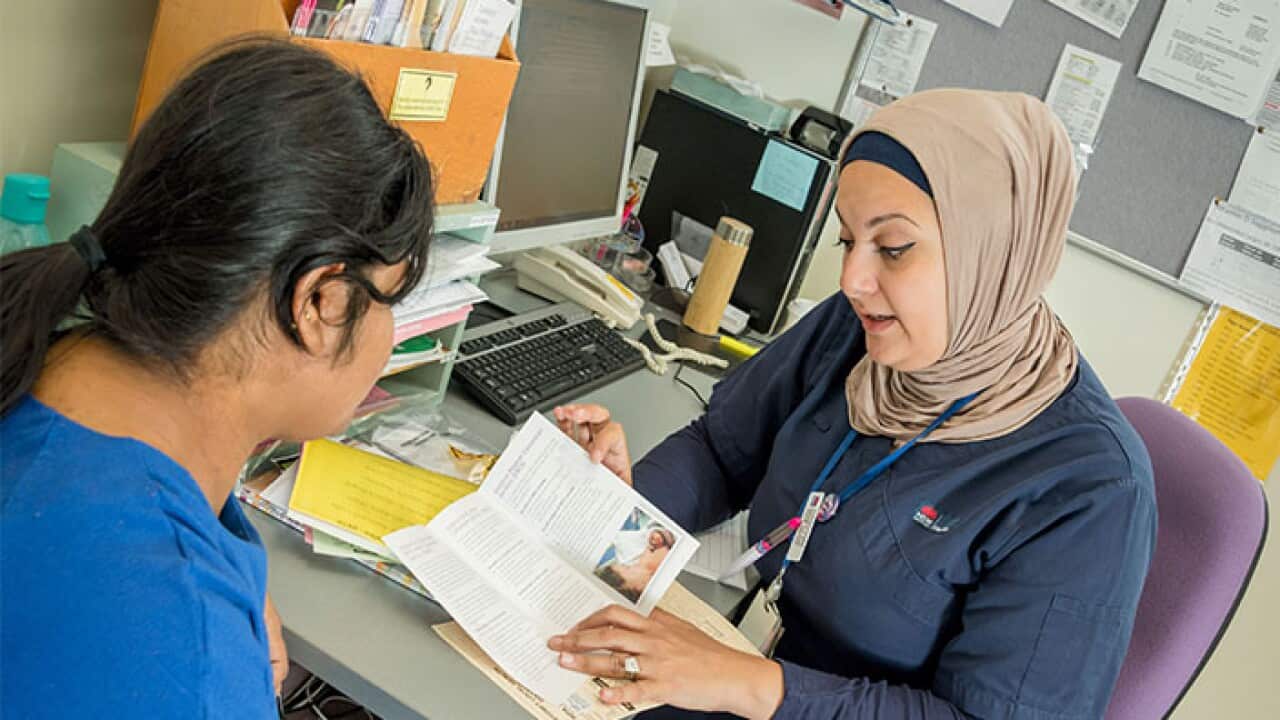 Discussion between hospital staff and patient