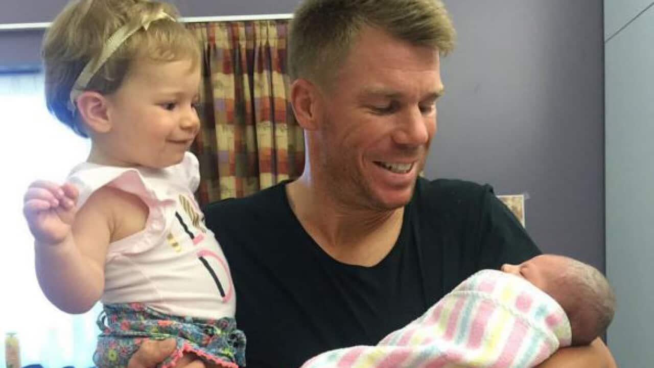 David Warner with his daughters