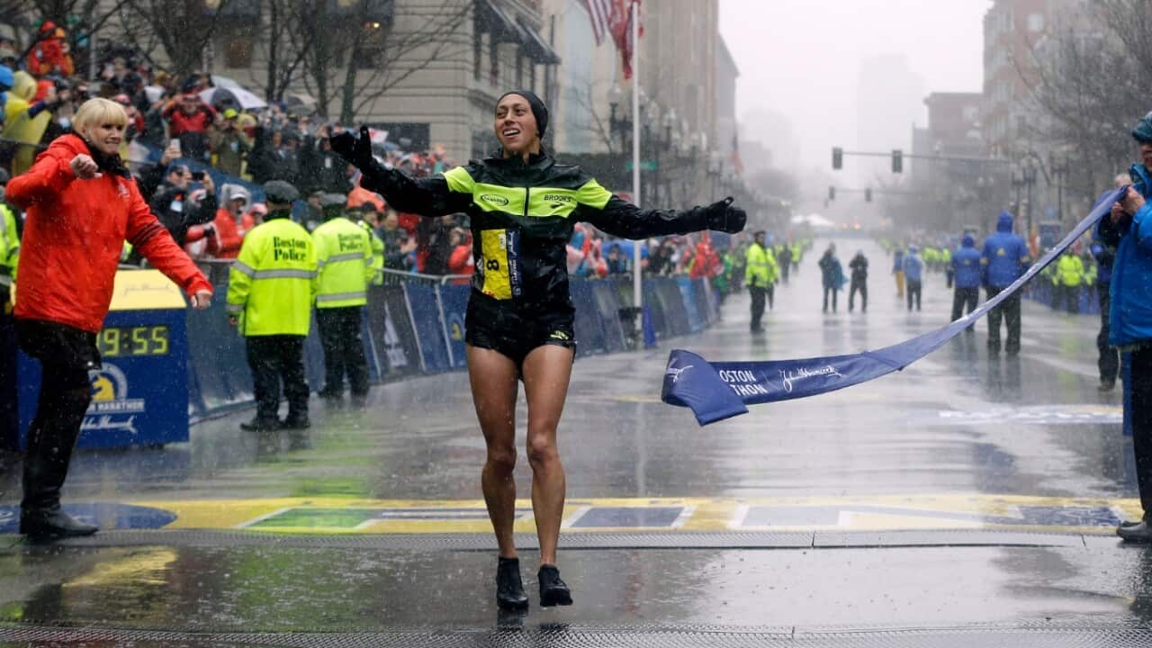 Desiree Linden, of Washington, Mich., wins the women's division of the 122nd Boston Marathon on Monday, April 16