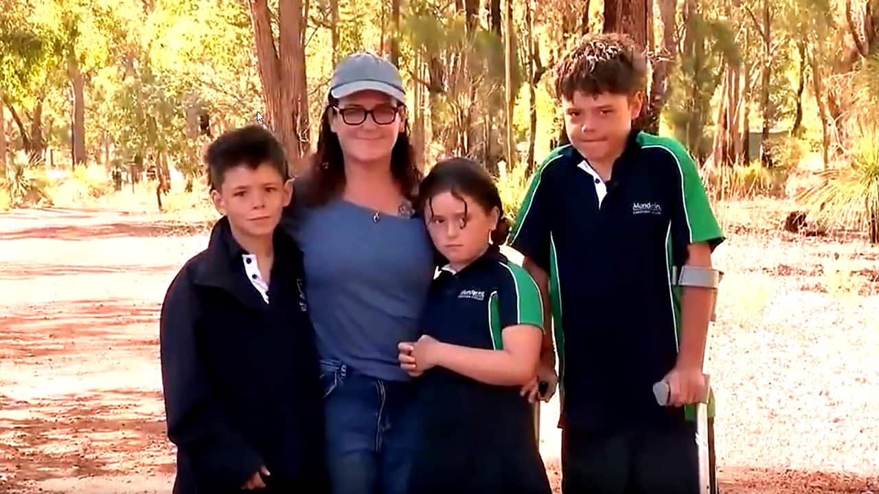 WA teen with his family