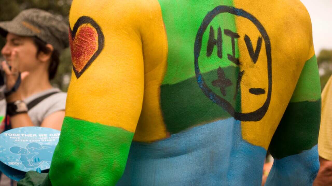 An HIV ambassador at a Mardi Gras event in 2008