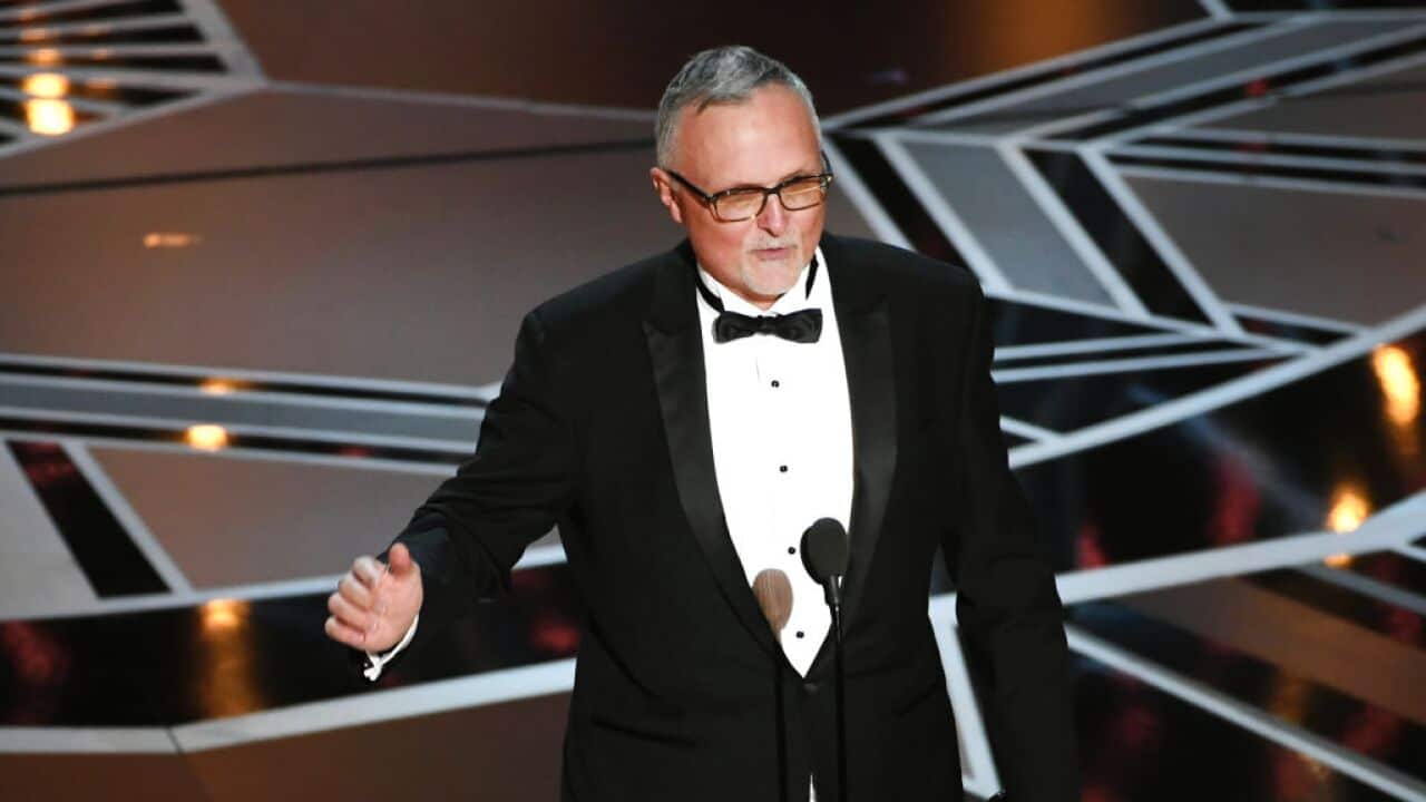 Editor Lee Smith accepts Best Film Editing for 'Dunkirk' onstage during the 90th Annual Academy Awards.