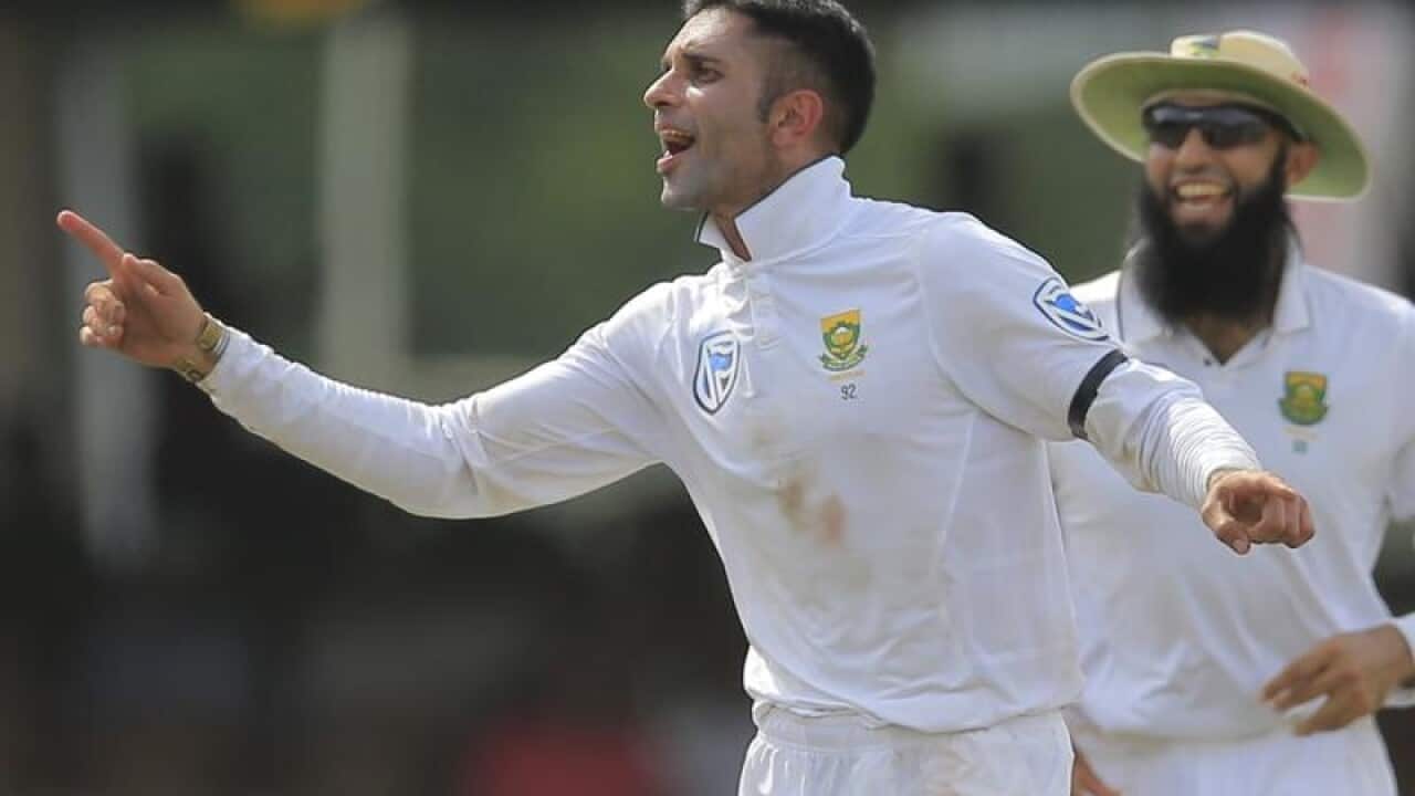South African cricketer Keshav Maharaj celebrates.