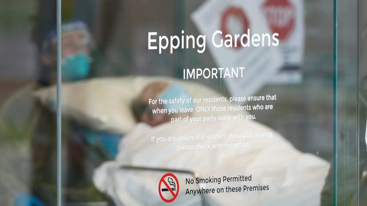 A resident is taken away in an ambulance from Epping Gardens Aged Care Facility in Epping, Melbourne, Tuesday, July 28, 2020.