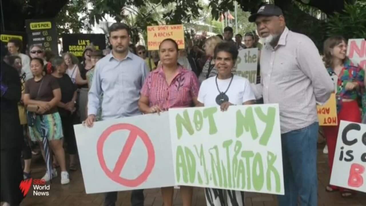 A Larrakia elder has been arrested amid chaotic scenes outside the Northern Territory Parliament today.