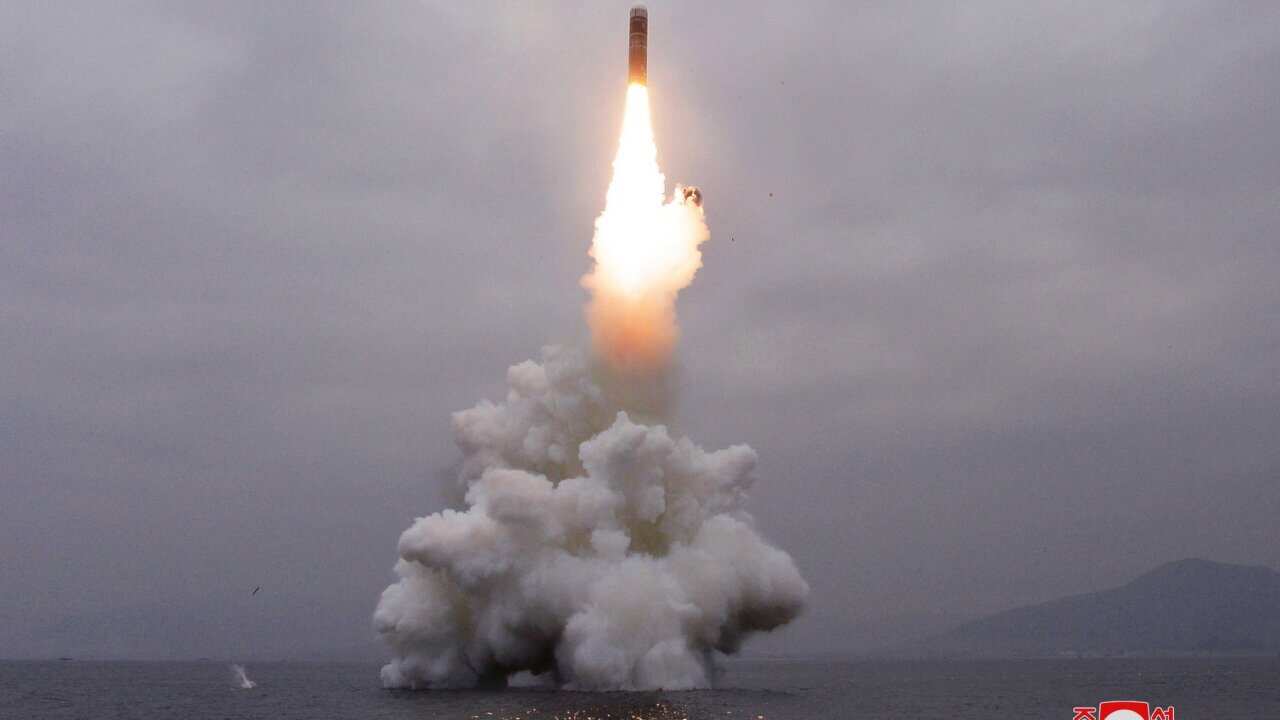 A photo released by the official North Korean Central News Agency (KCNA) shows the successful launch from a submarine of a Pukguksong-3, a new-type ballistic missile by the Academy of Defence Science of the Democratic People's Republic of Korea, in the wa