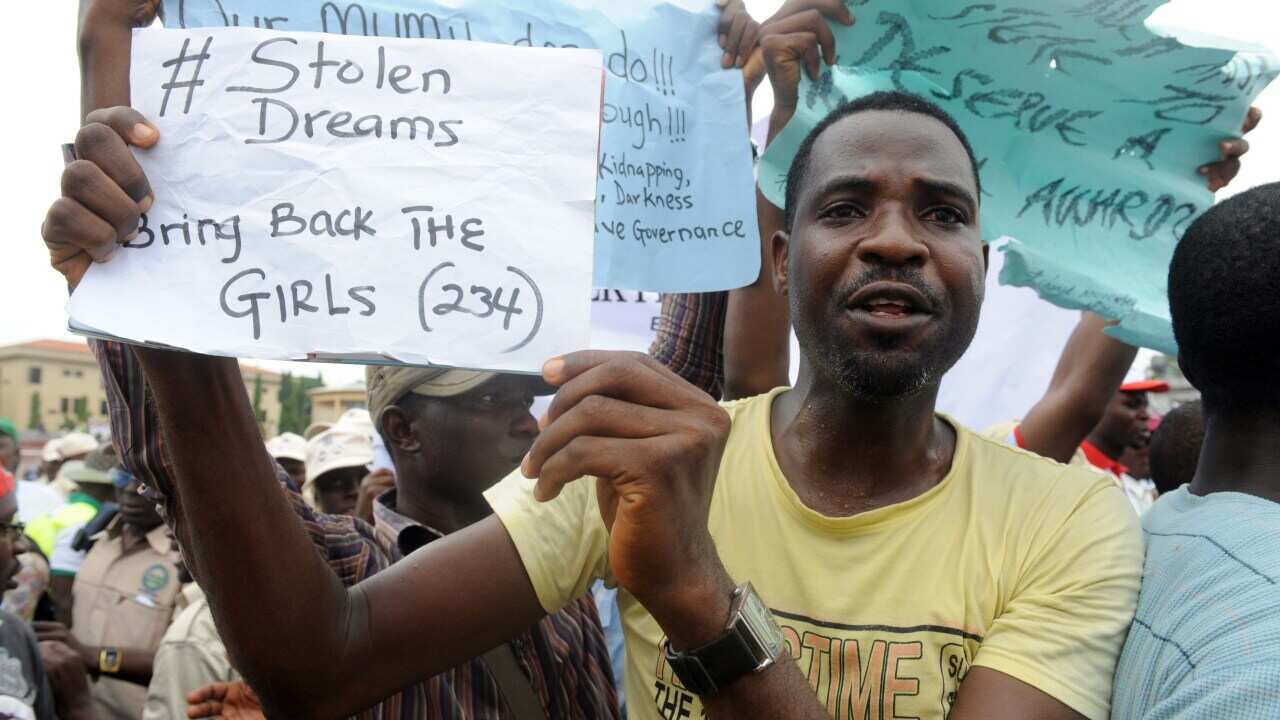 A man campaigns for the release of schoolgirls kidnapped by Boko Haram Islamists more than two weeks ago (Getty/AFP)