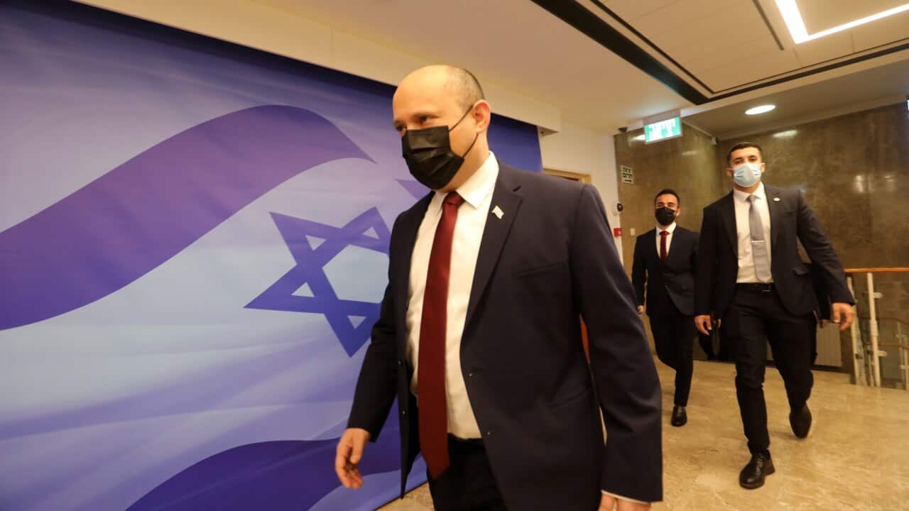Israeli Prime Minister Naftali Bennet arrives at his office.