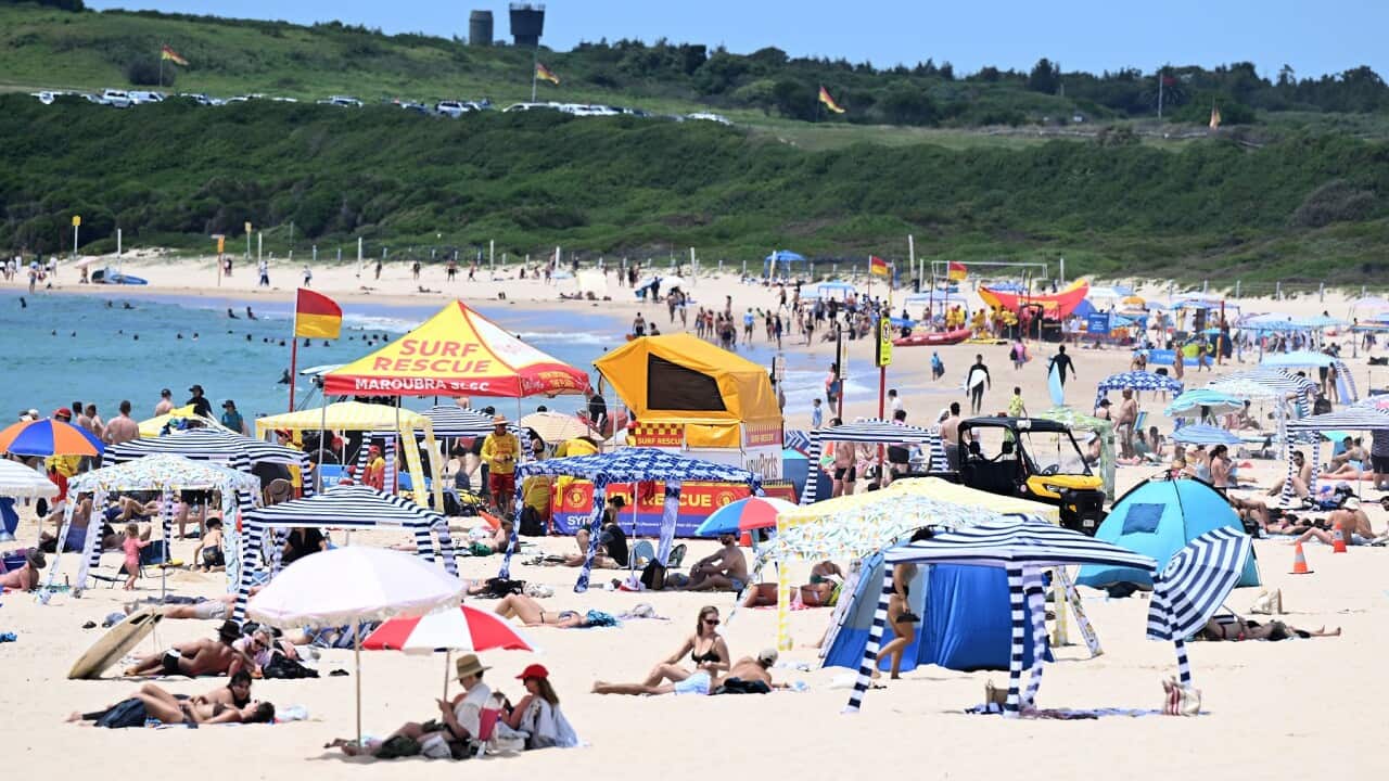 Beachgoers are seen at Maroubra Beach, Sydney (AAP)