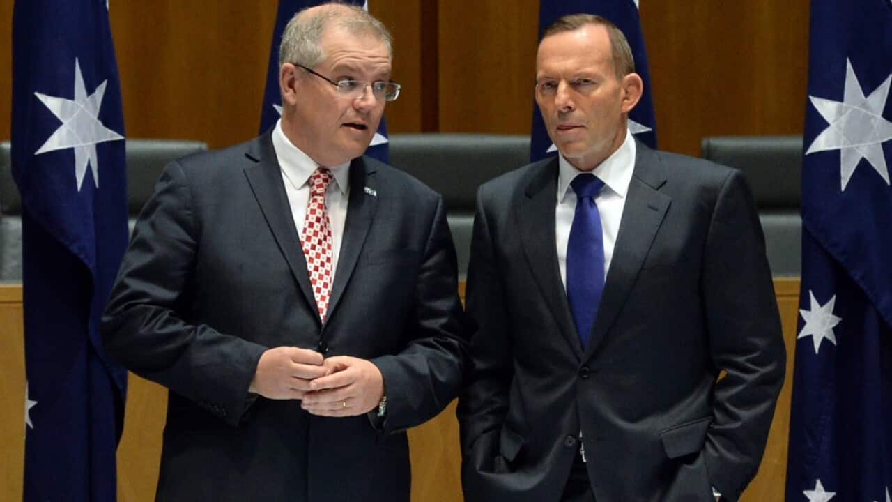 File image of then Australian Federal Social Services Minister Scott Morrison (left) and then Australian Prime Minister Tony Abbott, right.