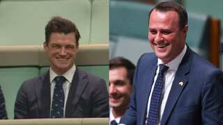 Liberal MP Tim Wilson has proposed to his partner, left, on the floor of federal parliament.
