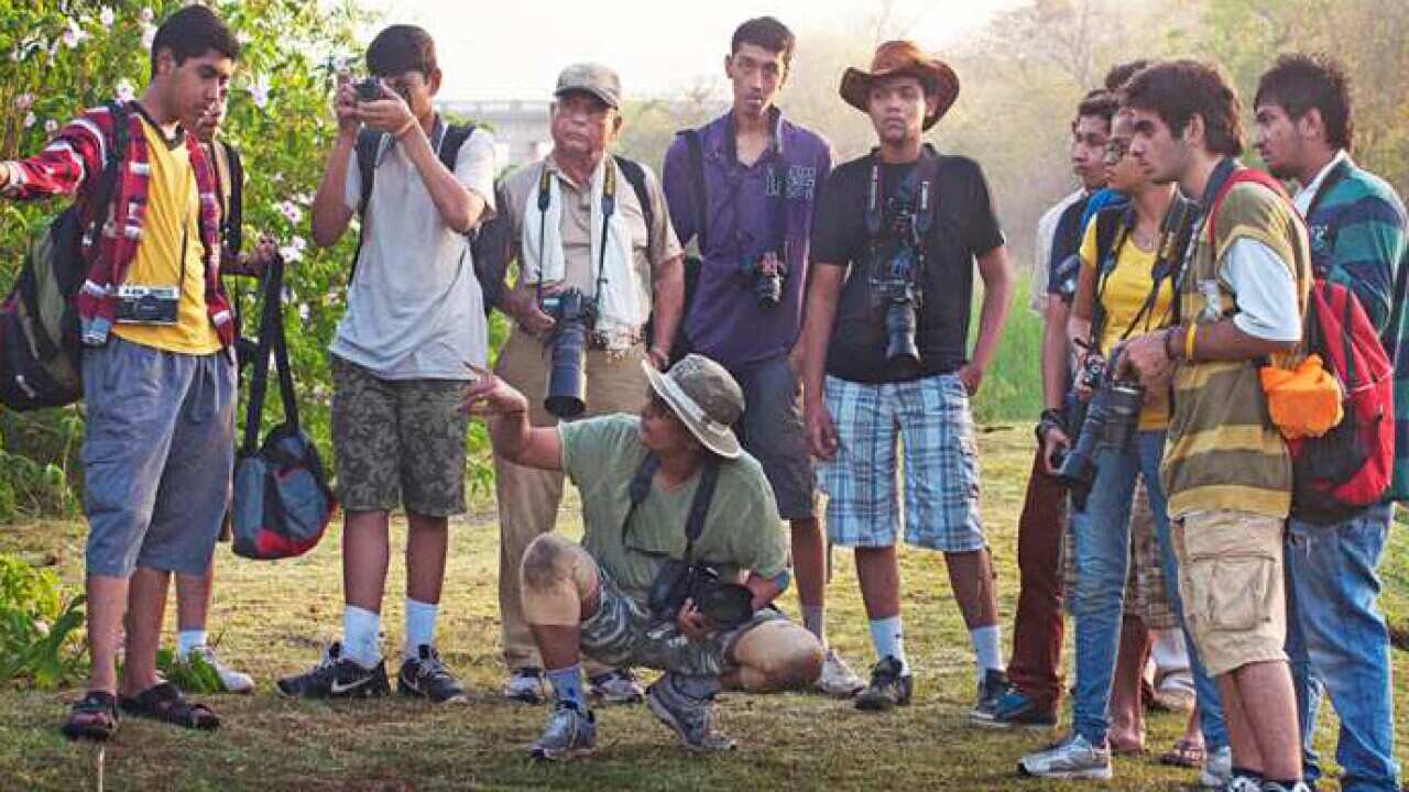 Mukesh Acharya conducting photography workshop in Gir National Park