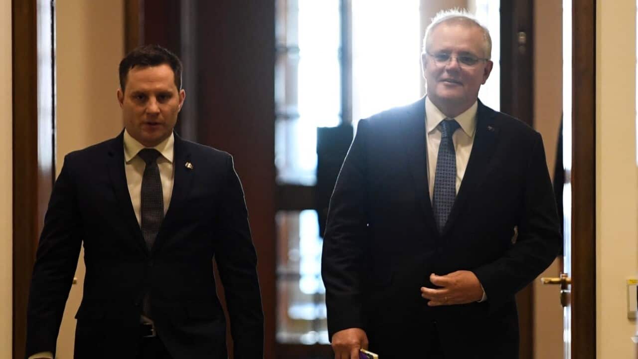 Australian Prime Minister Scott Morrison (right) and Immigration Minister Alex Hawke.