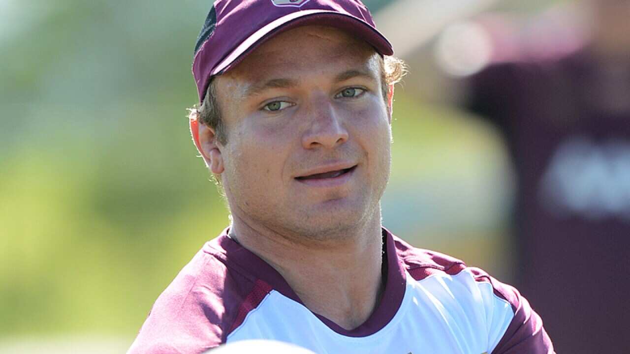 Jake Friend passes the ball during origin training.