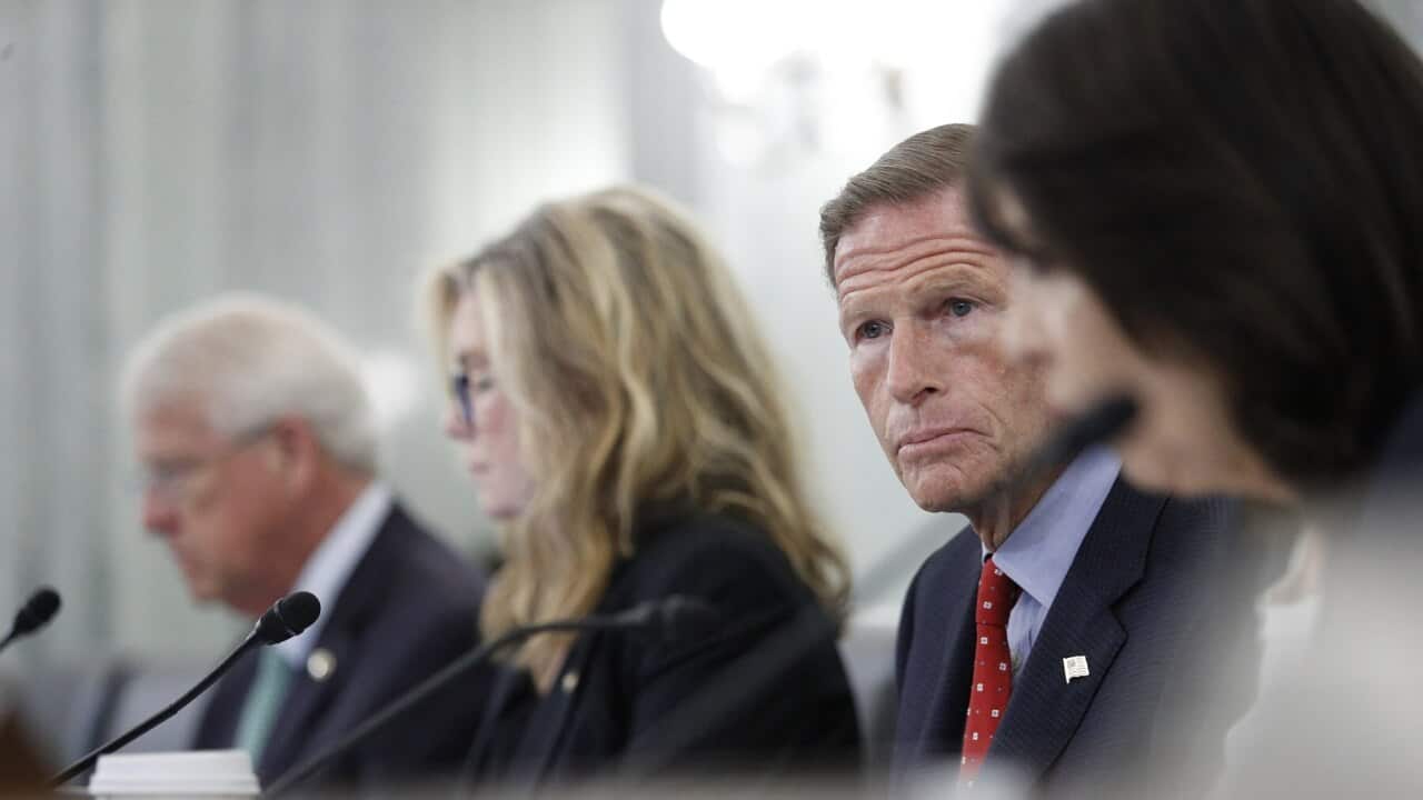 Senator Richard Blumenthal looks on as Facebook's Antigone Davis testifies before the Senate
