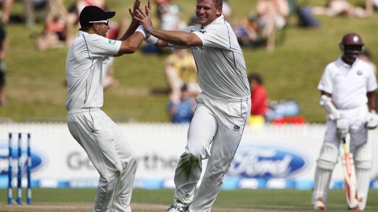 New Zealand's Corey Anderson, right, celebrates with Kane Williamson.