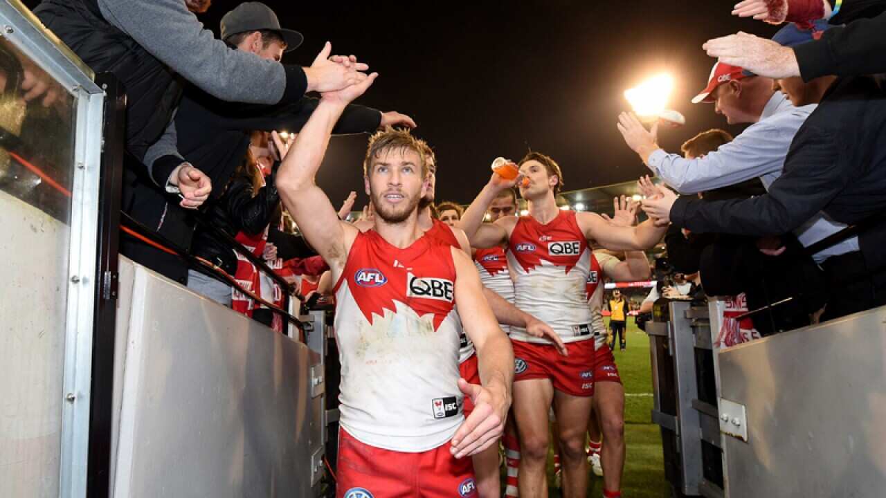 The Swans celebrate their win