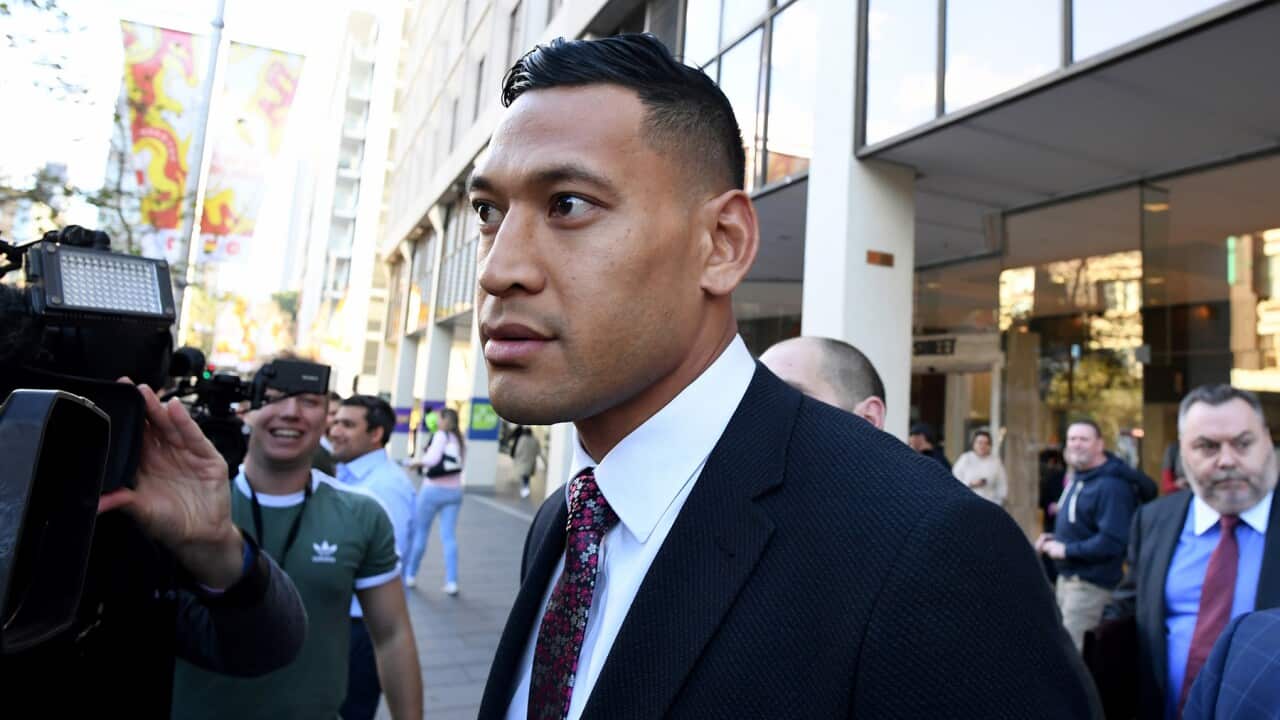 Israel Folau arrives for a conciliation hearing at the Fair Work Commission in June