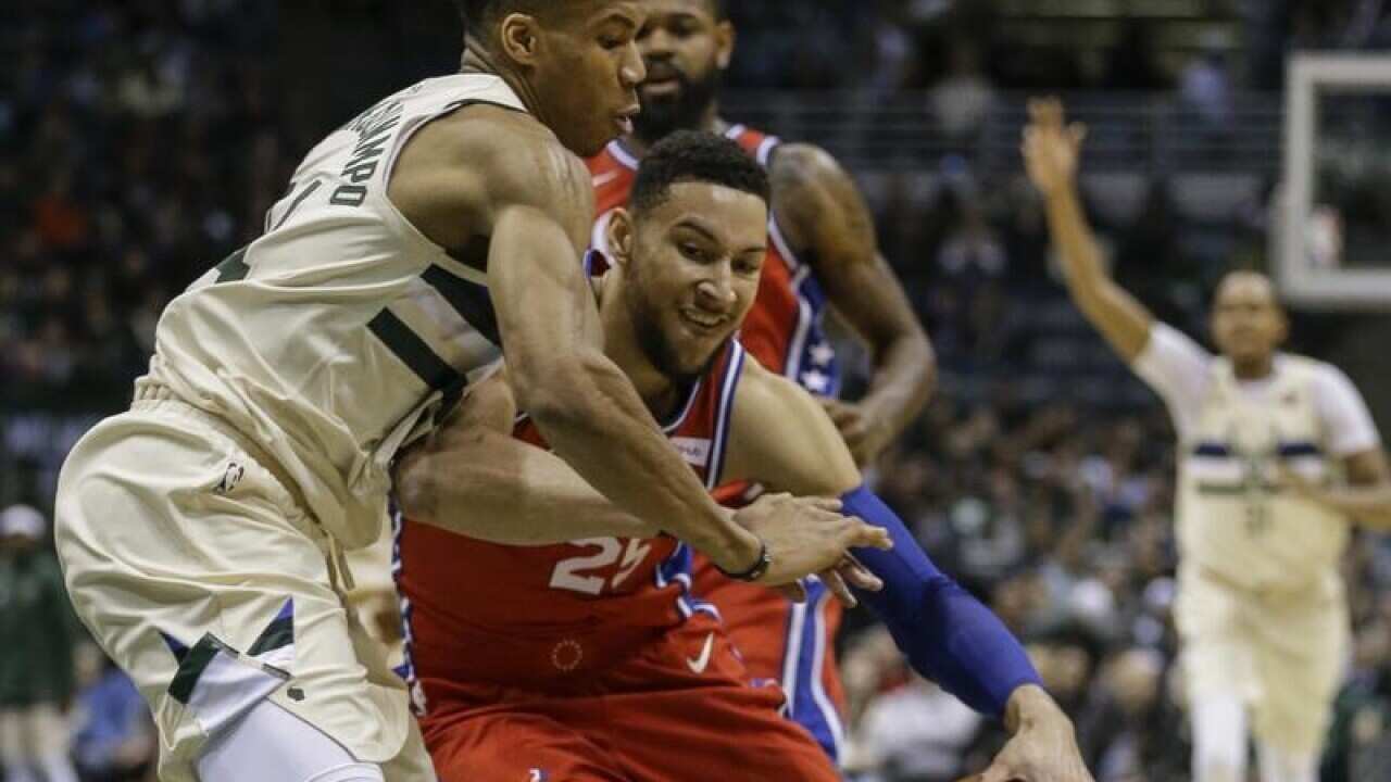 Milwaukee's Giannis Antetokounmpo and Philadelphia's Ben Simmons