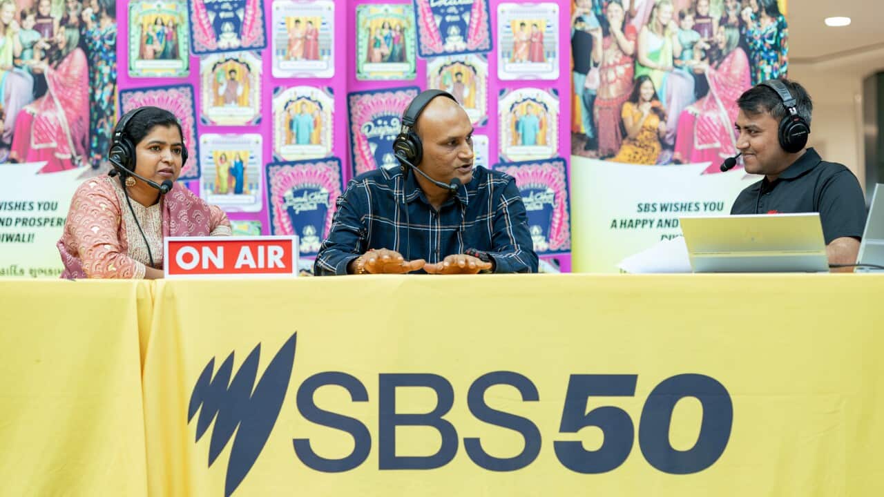 Chaitali and Kinjal Nayak talk about celebrating Indian festivals in Cairns with SBS Gujarati Executive Producer Vatsal Patel during the special outdoor broadcast at Cairns Central Shopping Centre on Thursday, October 9, 2025. Credit: SBS