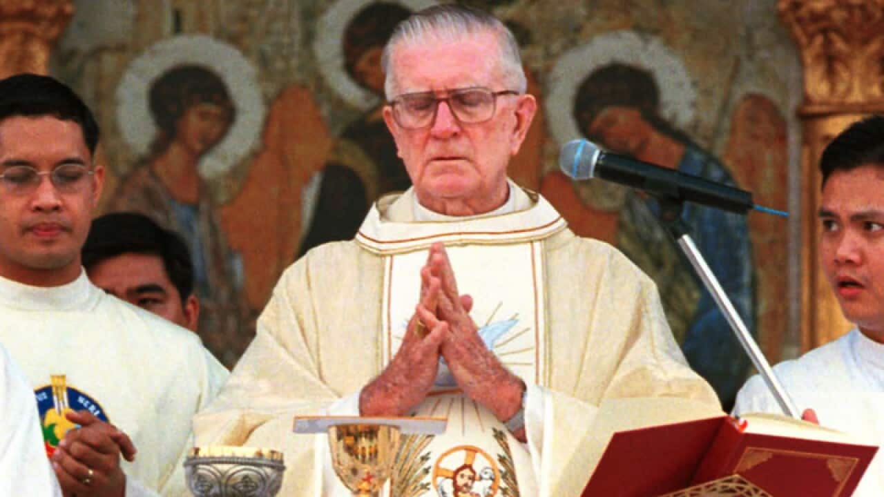 Archbishop of Sydney, Edward Cardinal Clancy (C).