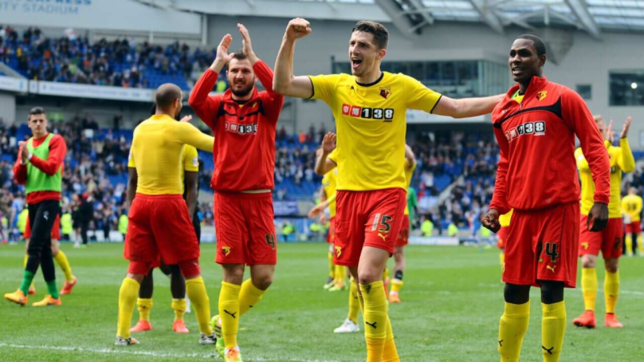 Watford players celebrate with the fans