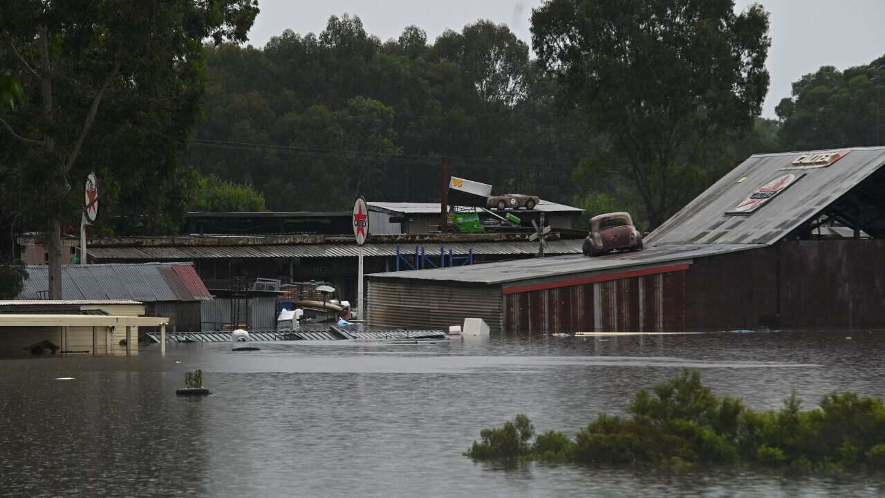 Structures are seen during flooding in Richmond, north west of Sydney, on Monday.