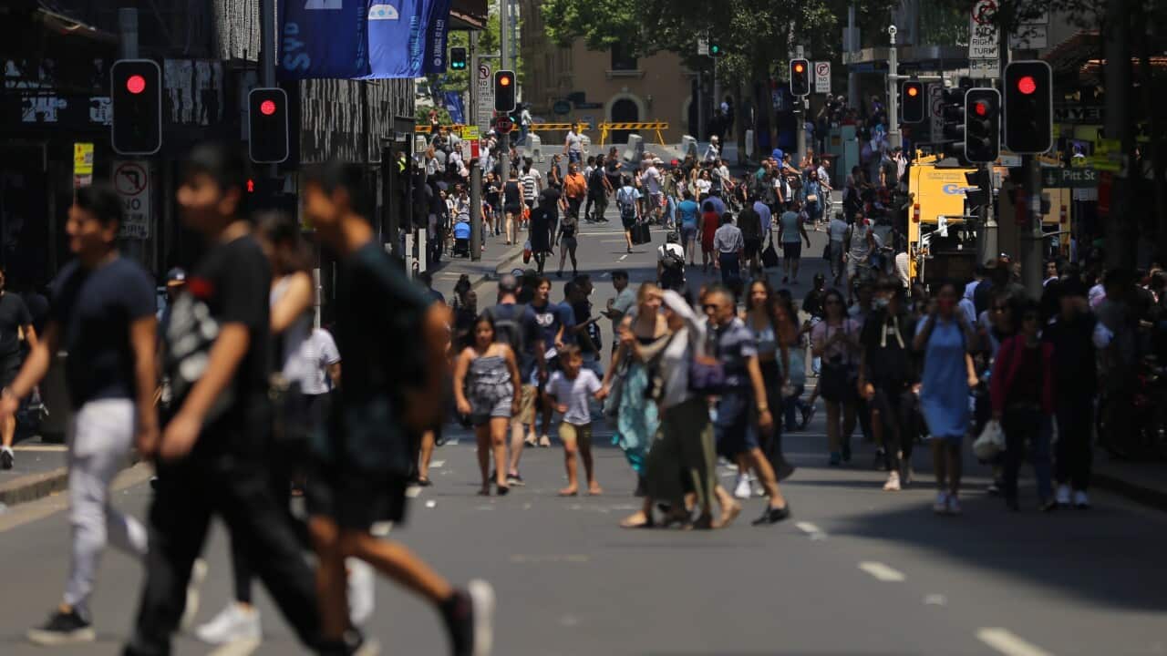 Shoppers walk the streets