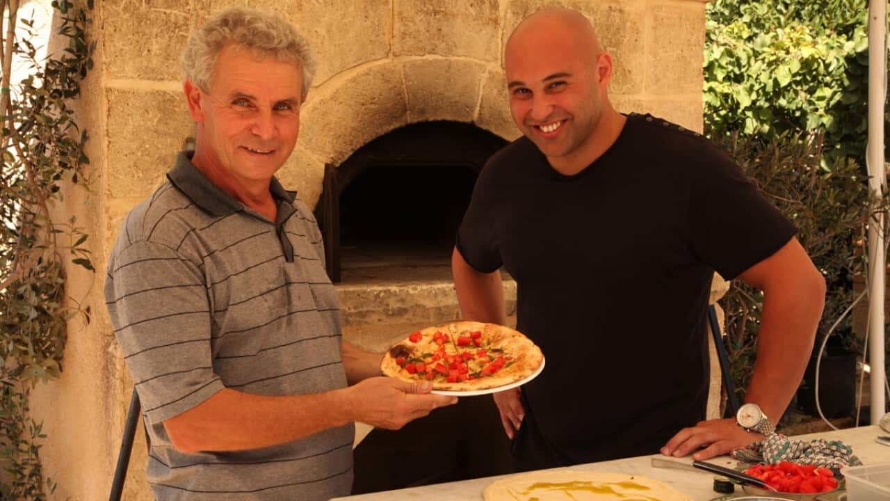 Shane-and-Joe-w-mini-pizza,-Malta-copy.jpg