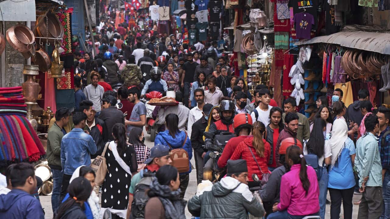 Kathmandu, Nepal - April 1, 2019: Crowded and busy commercial street of Asan Tole near Indra Chowk