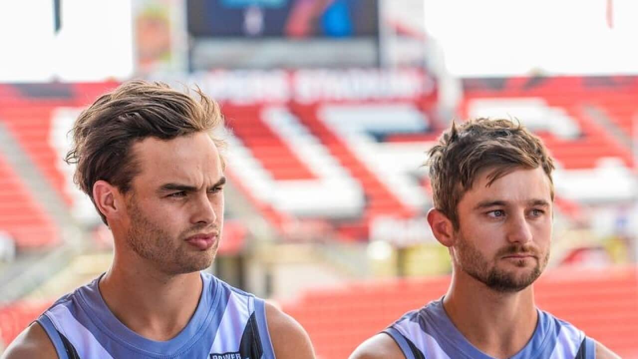 Port Adelaide Power players Karl Amon and Sam Gray (R)