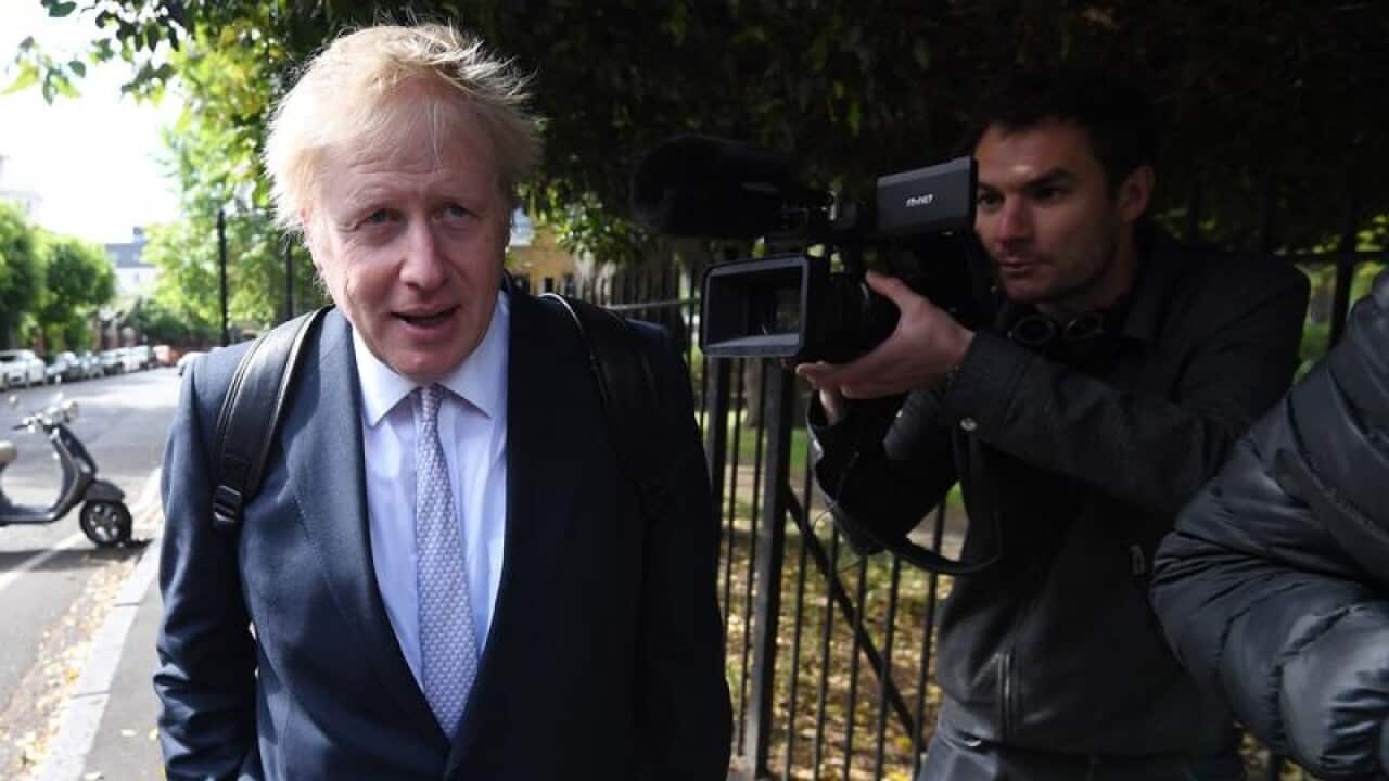 Conservative MP Boris Johnson leaves his house in London.