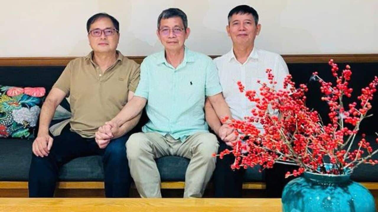 Tran Huynh Duy Thuc (in the middle) united with his long-time associates Le Cong Dinh (left) and Le Thanh Long (right), after nearly 16 years in prison (Courtesy to THDT).jpg
