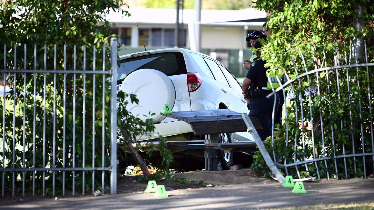 A car seen after going through a fence at Auburn South Primary School.